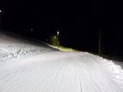 Sciare in notturna Söll