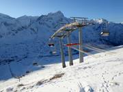Alpe Alta - 4pers.| Seggiovia ad alta velocità (ad agganciamento automatico) con cupole di protezione