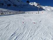 Area principianti a Les Agudes Village con tappeto mobile