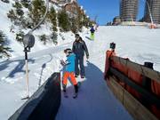 Assistenza per la salita allo skilift a piattello