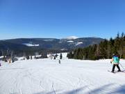 Area sciistica Malá Úpa con vista sulla Schneekoppe