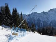 Innevamento della discesa a valle verso Falcade