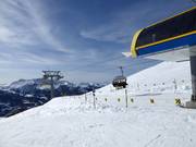 Bühlberg-Hahnenmoos - 6pers.| Seggiovia ad alta velocità (ad agganciamento automatico) con cupole di protezione