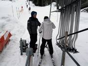 Assistenza per la salita allo skilift a piattello