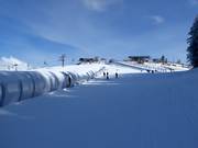 Area principianti presso la stazione a monte della Hartkaiserbahn a Ellmau
