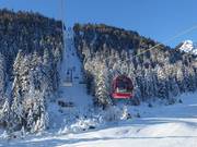 Almkopfbahn - Seggiocabinovia con seggiole 6 posti e cabine 8 posti