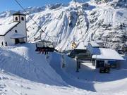 Große Karbahn - 6pers.| Seggiovia ad alta velocità (ad agganciamento automatico) con cupole di protezione