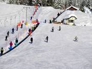 Tappeto mobile accanto al Village Platter