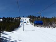 Lewis & Clark - 4pers.| Seggiovia ad alta velocità (ad agganciamento automatico) con cupole di protezione