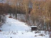 Discesa nel bosco presso la seggiovia Wurzelbrunnen-Lift