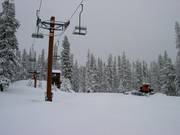 Preparazione delle piste alla stazione a monte