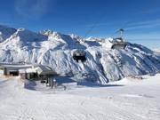 Plattachbahn II - 4pers.| Seggiovia ad alta velocità (ad agganciamento automatico) con cupole di protezione