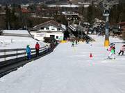 Tappeto mobile alla stazione a valle della cabinovia