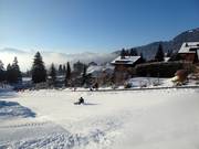 Pista da slittino gratuita a Villars con tapis roulant proprio