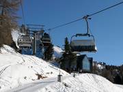 Obereggen-Oberholz - 4pers.| Seggiovia ad alta velocità (ad agganciamento automatico) con cupole di protezione