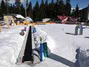 Area bambini con tappeto magico