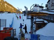 Assistenza per la salita allo skilift a piattello