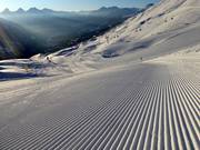 Le piste invitano al carving da sogno al mattino.