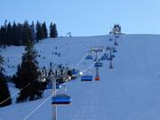 Waldkopf-6er-Sesselbahn - 6pers.| Seggiovia ad alta velocità (ad agganc. autom.) con cupola di prot. e riscald. sedile