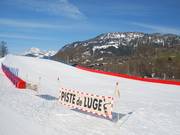 Pista da slittino a Praz sur Arly, vicino alla stazione a valle della seggiovia Crête du Midi