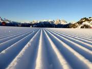 Preparazione delle piste di prima classe nell’area sciistica Civetta