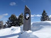 Il monumento sulla Cima del Paion è dedicato a Carlo Donei, maestro di sci e fondatore della Scuola di Sci Alpe Cermis