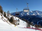 Patascoss - 4pers.| Seggiovia ad alta velocità (ad agganciamento automatico) con cupole di protezione