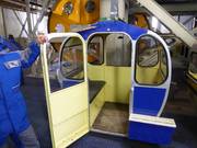 Il personale cordiale aiuta a salire sulla cabinovia.