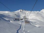 Kringsalmbahn - 6pers.| Seggiovia ad alta velocità (ad agganciamento automatico) con cupole di protezione