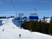 Bernkogel 6er - 6pers.| Seggiovia ad alta velocità (ad agganc. autom.) con cupola di prot. e riscald. sedile