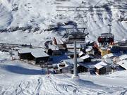 Übungshangbahn - 6pers.| Seggiovia ad alta velocità (ad agganc. autom.) con cupola di prot. e riscald. sedile