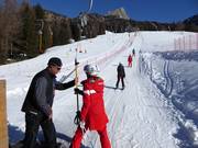 Assistenza per la salita allo skilift a piattello