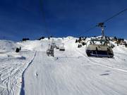 Zentralbahn - 4pers.| Seggiovia ad alta velocità (ad agganciamento automatico) con cupole di protezione