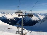 Höhenweg-Weissfluhjoch (Parsenn Rapid) - 6pers.| Seggiovia ad alta velocità (ad agganciamento automatico) con cupole di protezione