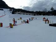 Area bambini con tappeto magico