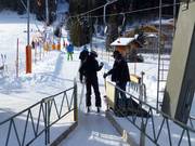 Assistenza per la salita allo skilift a piattello