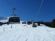 Schlegelkopfbahn 1 - 4pers.| Seggiovia ad alta velocità (ad agganc. autom.) con cupola di prot. e riscald. sedile