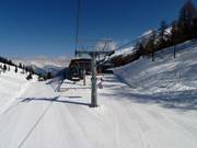 Tortin - 4pers.| Seggiovia ad alta velocità (ad agganciamento automatico) con cupole di protezione