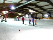 Pista per principianti pianeggiante all’ingresso dell’arena sciistica