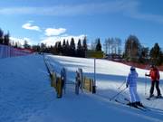 Area pratica con tappeto a Serrada