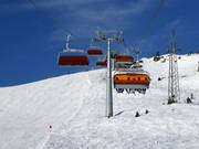 Kreuzwiesn-X-Press - 6pers.| Seggiovia ad alta velocità (ad agganciamento automatico) con cupole di protezione