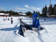 Huttumaan Taikamatto - Tapis roulant/Tappeto Magico