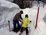 Assistenza per la salita allo skilift a piattello