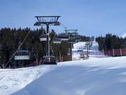 Dacheggbahn - 6pers.| Seggiovia ad alta velocità (ad agganciamento automatico) con cupole di protezione