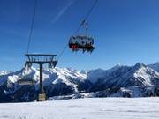 Schneekarbahn - 6pers.| Seggiovia ad alta velocità (ad agganciamento automatico) con cupole di protezione