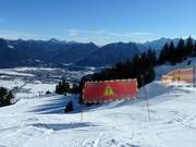 Avviso di pericolo nell’area sciistica